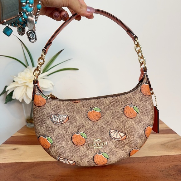NWT COACH MINI PAYTON BAG IN SIGNATURE CANVAS WITH ORANGE PRINT - Picture 1 of 7